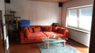 Wohnzimmer 1 - Ankommen, Durchatmen & Wohlfühlen – Charmante 3-Zimmer-Dachgeschosswohnung mit Loggia in Jockgrim!